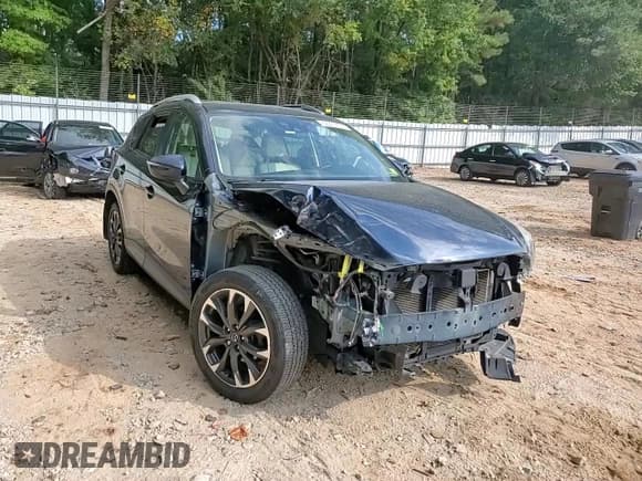 ✅ 2016 Mazda CX-5 Grand Touring • VIN: JM3KE2DY9G0806751 • Lot: 82260835. Listed on Copart with 144,275 mi. Free auction sales archive from the USA and detailed vehicle history report at DreamBid. Image 14.