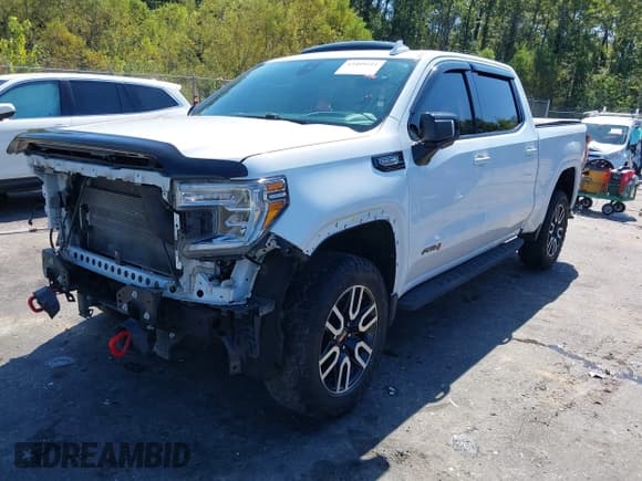 ✅ 2021 GMC Sierra 1500 AT4 • VIN: 3GTP9EEL6MG189033 • Лот: 43409211. Опубликован ранее на IAAI с пробегом 111 249 миль. Бесплатный доступ к архиву аукционных продаж из США и подробный отчёт об истории автомобиля на DreamBid. Изображение 2.