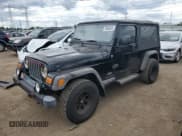✅ 2005 Jeep Wrangler Unlimited • VIN: 1J4FA44S25P335120 • Lot: 70306025. Listed on Copart with 137,315 mi. Free auction sales archive from the USA and detailed vehicle history report at DreamBid. Image 1.
