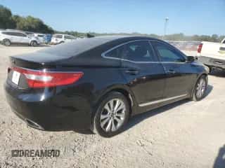 2013 Hyundai Azera с VIN KMHFG4JG7DA217419, выставлен на аукционе Copart как лот 69759134 с пробегом 90 918 миль миль и Списание • Salvage title. История ставок и продаж доступна на DreamBid. Изображение 3.
