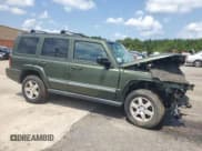 ✅ 2009 Jeep Commander Sport • VIN: 1J8HG48K59C511283 • Lot: 69678195. Listed on Copart with 236,781 mi. Free auction sales archive from the USA and detailed vehicle history report at DreamBid. Image 4.