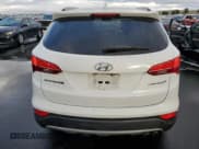 ✅ 2014 Hyundai Santa Fe • VIN: 5XYZU3LA7EG228368 • Лот: 91273625. Опубликован ранее на Copart с пробегом 82 499 миль. Бесплатный доступ к архиву аукционных продаж из США и подробный отчёт об истории автомобиля на DreamBid. Изображение 7.