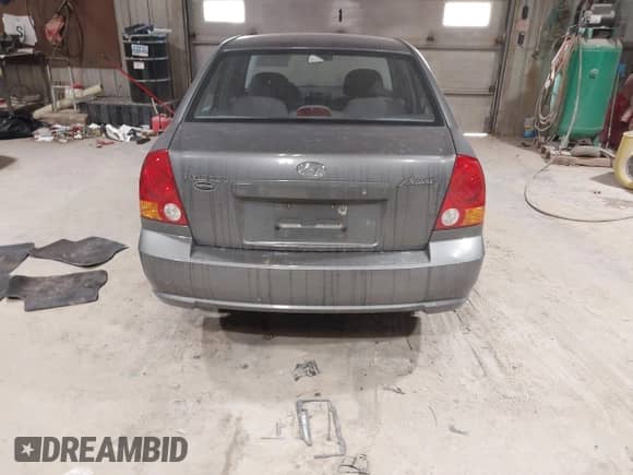 2004 Hyundai Accent GL z VIN KMHCG45C44U528783, wystawiony jako IAAI lot #41535104 z przebiegiem Nie podano mil oraz . Historia ofert i sprzedaży dostępna na DreamBid. Obrazek 16.