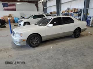 ✅ 1999 Lexus LS 400 • VIN: JT8BH28F8X0163154 • Lot: 67848065. Wystawiony na Copart z przebiegiem 123 800 mil. Bezpłatny archiwum sprzedaży aukcyjnych z USA i szczegółowy raport historii pojazdu na DreamBid. Zdjęcie 1.