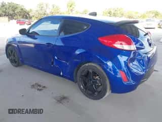 2012 Hyundai Veloster w/Gray Int z VIN KMHTC6AD2CU065076, wystawiony jako IAAI lot #43421355 z przebiegiem 152 752 mil mil oraz . Historia ofert i sprzedaży dostępna na DreamBid. Obrazek 3.