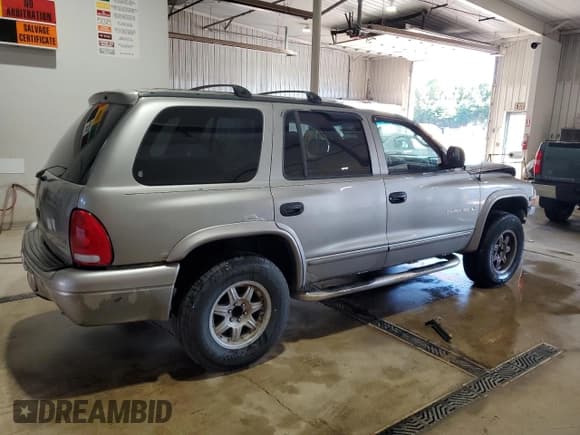 ✅ 2000 Dodge Durango • VIN: 1B4HS28N0YF282316 • Lot: 69830425. Wystawiony na Copart z przebiegiem 240 000 mil. Bezpłatny archiwum sprzedaży aukcyjnych z USA i szczegółowy raport historii pojazdu na DreamBid. Zdjęcie 3.