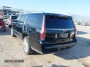 ✅ 2015 Cadillac Escalade ESV Platinum • VIN: 1GYS4UKJ5FR660169 • Lot: 43119765. Listed on IAAI with 174,669 mi. Free auction sales archive from the USA and detailed vehicle history report at DreamBid. Image 3.