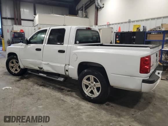 2008 Dodge Dakota Bighorn/Lonestar with VIN 1D7HE38K88S590577, listed as a Copart auction lot 73517754 with 128,163 mi miles and Salvage title. Bid and sale history available at DreamBid. Image 2.