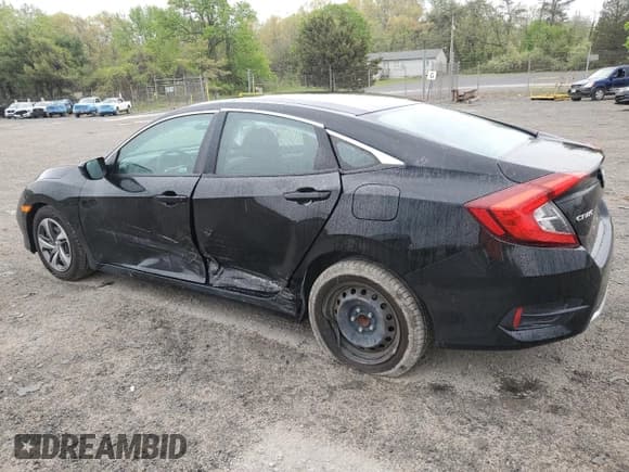 ✅ 2021 Honda Civic LX • VIN: 2HGFC2F6XMH502056 • Lot: 54393025. Listed on Copart with 57,080 mi. Free auction sales archive from the USA and detailed vehicle history report at DreamBid. Image 2.