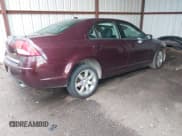 ✅ 2011 Mercury Milan Premier • VIN: 3MEHM0JG6BR605578 • Lot: 42125505. Listed on IAAI with 148,634 mi. Free auction sales archive from the USA and detailed vehicle history report at DreamBid. Image 4.