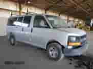 2010 Chevrolet Express Passenger LS with VIN 1GAZGPDG0A1167157, listed as a Copart auction lot 88460465 with 166,141 mi miles and Salvage title. Bid and sale history available at DreamBid. Image 4.