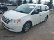 ✅ 2012 Honda Odyssey Touring • VIN: 5FNRL5H9XCB126080 • Lot: 43686755. Listed on IAAI with 116,383 mi. Free auction sales archive from the USA and detailed vehicle history report at DreamBid. Image 17.