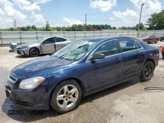✅ 2012 Chevrolet Malibu 1LS • VIN: 1G1ZB5E09CF291907 • Lot: 62184535. Listed on Copart with 136,064 mi. Free auction sales archive from the USA and detailed vehicle history report at DreamBid. Image 1.