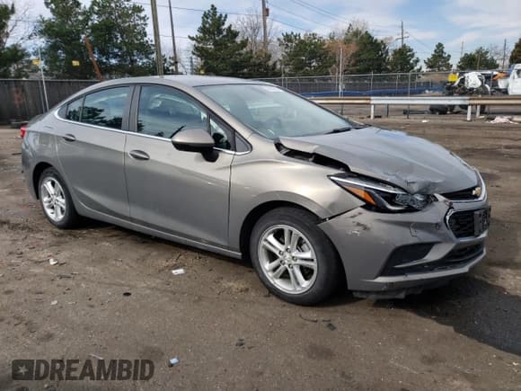 ✅ 2017 Chevrolet Cruze LT • VIN: 1G1BE5SM7H7208198 • Lot: 49836943. Listed on Copart with 27,662 mi. Free auction sales archive from the USA and detailed vehicle history report at DreamBid. Image 4.