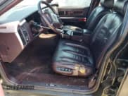 ✅ 1994 Cadillac Fleetwood • VIN: 1G6DW52PXRR704063 • Лот: 75345394. Опубликован ранее на Copart с пробегом 96 067 миль. Бесплатный доступ к архиву аукционных продаж из США и подробный отчёт об истории автомобиля на DreamBid. Изображение 7.