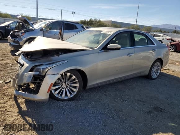 ✅ 2016 Cadillac CTS Luxury Collection RWD • VIN: 1G6AR5SX3G0103038 • Лот: 66895675. Опубликован ранее на Copart с пробегом 101 993 миль. Бесплатный доступ к архиву аукционных продаж из США и подробный отчёт об истории автомобиля на DreamBid. Изображение 1.