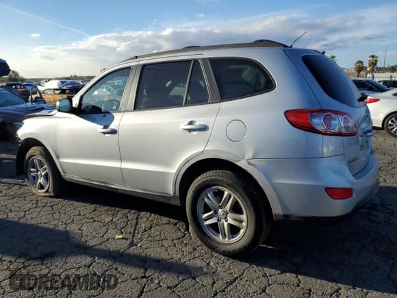 ✅ 2010 Hyundai Santa Fe GLS • VIN: 5NMSG3ABXAH394307 • Lot: 82799674. Listed on Copart with 153,392 mi. Free auction sales archive from the USA and detailed vehicle history report at DreamBid. Image 2.