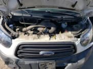 ✅ 2018 Ford Transit • VIN: 1FTYR2XM4JKA85105 • Lot: 84306614. Listed on Copart with 125,511 mi. Free auction sales archive from the USA and detailed vehicle history report at DreamBid. Image 12.