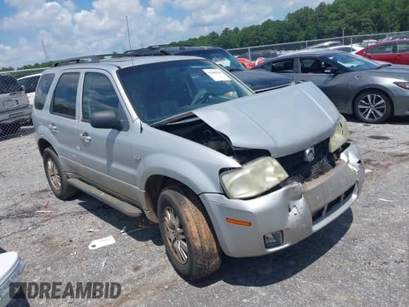 2005 Mercury Mariner Luxury z VIN 4M2YU561X5DJ09502, wystawiony jako IAAI lot #37069354 z przebiegiem Nie podano mil oraz . Historia ofert i sprzedaży dostępna na DreamBid. Obrazek 1.