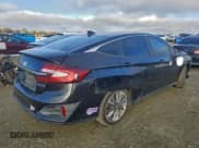 ✅ 2018 Honda Clarity • VIN: JHMZC5F11JC012250 • Лот: 93790105. Опубликован ранее на Copart с пробегом 68 370 миль. Бесплатный доступ к архиву аукционных продаж из США и подробный отчёт об истории автомобиля на DreamBid. Изображение 3.