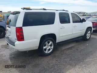 2007 Chevrolet Suburban LT z VIN 3GNFC16087G170022, wystawiony jako IAAI lot #43283810 z przebiegiem 232 787 mil mil oraz . Historia ofert i sprzedaży dostępna na DreamBid. Obrazek 4.