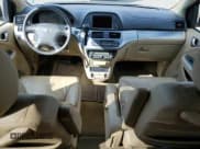 ✅ 2010 Honda Odyssey EX-L • VIN: 5FNRL3H77AB060572 • Lot: 82253525. Listed on Copart with 95,772 mi. Free auction sales archive from the USA and detailed vehicle history report at DreamBid. Image 8.