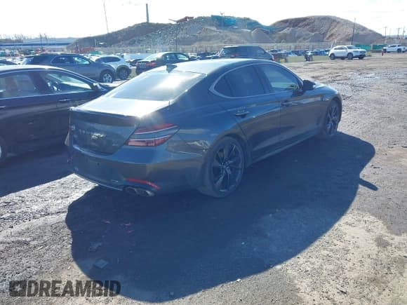 ✅ 2023 Genesis G70 2.0T • VIN: KMTG34TA9PU109174 • Lot: 41582887. Listed on IAAI with 72,996 mi. Free auction sales archive from the USA and detailed vehicle history report at DreamBid. Image 4.