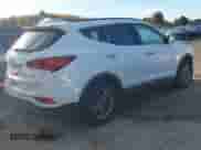 2018 Hyundai Santa Fe 2.4L z VIN 5NMZUDLB1JH097002, wystawiony jako IAAI lot #43473652 z przebiegiem 182 069 mil mil oraz . Historia ofert i sprzedaży dostępna na DreamBid. Obrazek 4.