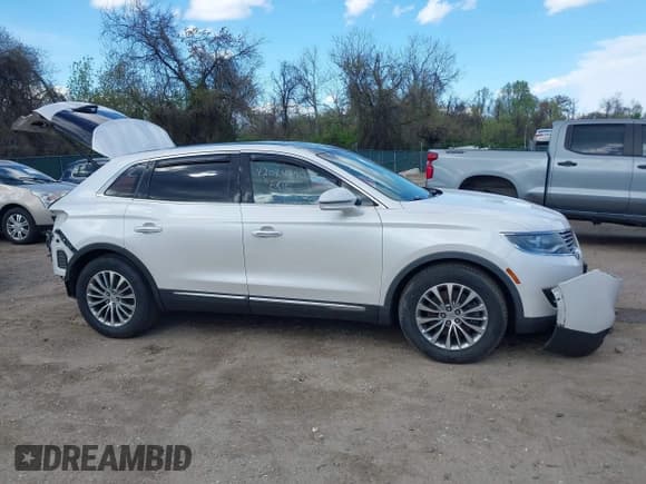 ✅ 2016 Lincoln MKX Select • VIN: 2LMPJ6KR7GBL59266 • Lot: 42044990. Listed on IAAI with 131,233 mi. Free auction sales archive from the USA and detailed vehicle history report at DreamBid. Image 14.