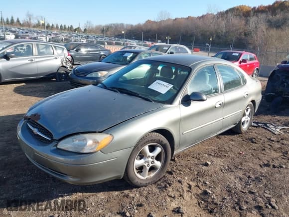 ✅ 2001 Ford Taurus SE • VIN: 1FAFP53U61G119347 • Lot: 43693455. Listed on IAAI with 150,165 mi. Free auction sales archive from the USA and detailed vehicle history report at DreamBid. Image 2.