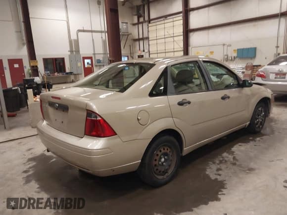✅ 2007 Ford Focus S • VIN: 1FAFP34N87W190236 • Lot: 39851045. Listed on IAAI with 130,835 mi. Free auction sales archive from the USA and detailed vehicle history report at DreamBid. Image 4.