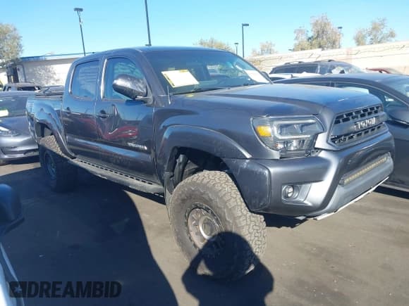 ✅ 2014 Toyota Tacoma PreRunner • VIN: 5TFJX4GN1EX031474 • Lot: 43596592. Listed on IAAI with 77,249 mi. Free auction sales archive from the USA and detailed vehicle history report at DreamBid. Image 1.