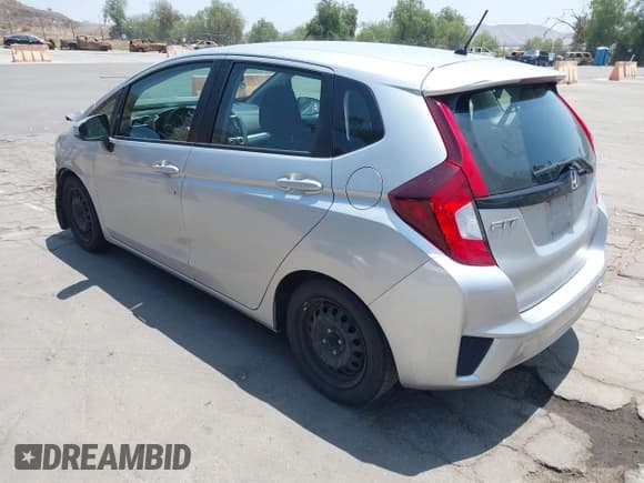 ✅ 2015 Honda Fit LX • VIN: 3HGGK5H58FM784019 • Lot: 42332884. Listed on IAAI with 123,675 mi. Free auction sales archive from the USA and detailed vehicle history report at DreamBid. Image 3.