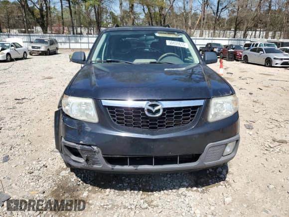 ✅ 2008 Mazda Tribute Grand Touring • VIN: 4F2CZ06118KM21700 • Lot: 50431615. Listed on Copart with 229,544 mi. Free auction sales archive from the USA and detailed vehicle history report at DreamBid. Image 5.