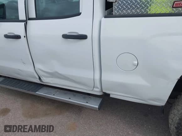 2019 Chevrolet Silverado 2500HD Work Truck z VIN 2GC2KREG7K1109849, wystawiony jako IAAI lot #41929119 z przebiegiem 168 182 mil mil oraz . Historia ofert i sprzedaży dostępna na DreamBid. Obrazek 13.