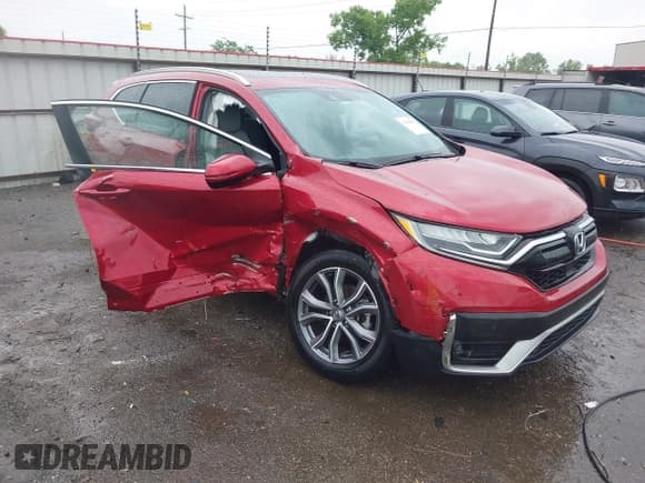 ✅ 2021 Honda CR-V Touring • VIN: 2HKRW2H9XMH663315 • Lot: 42188893. Listed on IAAI with 26,203 mi. Free auction sales archive from the USA and detailed vehicle history report at DreamBid. Image 1.