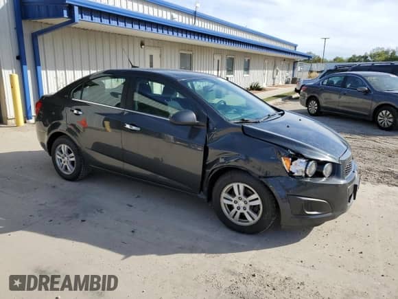 2014 Chevrolet Sonic LT z VIN 1G1JC5SH9E4165775, wystawiony jako Copart lot #73104784 z przebiegiem 109 625 mil mil oraz Czysty tytuł • Clean title. Historia ofert i sprzedaży dostępna na DreamBid. Obrazek 4.