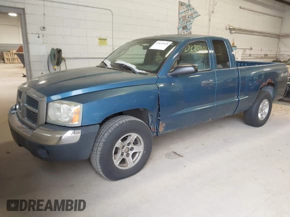 ✅ 2005 Dodge Dakota SLT • VIN: 1D7HW42KX5S195937 • Лот: 43635048. Опубликован ранее на IAAI с пробегом 157 666 миль. Бесплатный доступ к архиву аукционных продаж из США и подробный отчёт об истории автомобиля на DreamBid. Изображение 2.