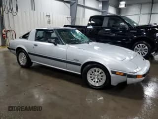 ✅ 1985 Mazda RX-7 • VIN: JM1FB3327F0881937 • Lot: 74971764. Wystawiony na Copart z przebiegiem 271 129 mil. Bezpłatny archiwum sprzedaży aukcyjnych z USA i szczegółowy raport historii pojazdu na DreamBid. Zdjęcie 4.