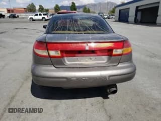 ✅ 1999 Saturn SC • VIN: 1G8ZN1288XZ310351 • Лот: 76677414. Опубликован ранее на Copart с пробегом Не указан. Бесплатный доступ к архиву аукционных продаж из США и подробный отчёт об истории автомобиля на DreamBid. Изображение 6.