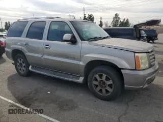 ✅ 2003 Cadillac Escalade • VIN: 1GYEK63N73R256351 • Lot: 92265365. Wystawiony na Copart z przebiegiem 194 305 mil. Bezpłatny archiwum sprzedaży aukcyjnych z USA i szczegółowy raport historii pojazdu na DreamBid. Zdjęcie 4.