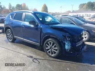 ✅ 2018 Mazda CX-5 Touring • VIN: JM3KFBCM4J0351052 • Lot: 43574119. Wystawiony na IAAI z przebiegiem 118 096 mil. Bezpłatny archiwum sprzedaży aukcyjnych z USA i szczegółowy raport historii pojazdu na DreamBid. Zdjęcie 1.