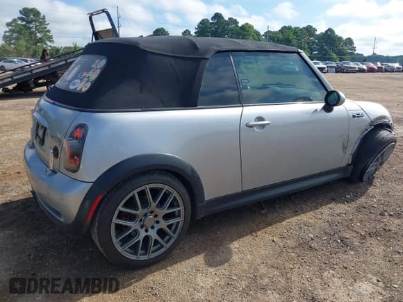 ✅ 2006 MINI Convertible S • VIN: WMWRH33566TF88566 • Lot: 42590555. Listed on IAAI with 73,128 mi. Free auction sales archive from the USA and detailed vehicle history report at DreamBid. Image 4.