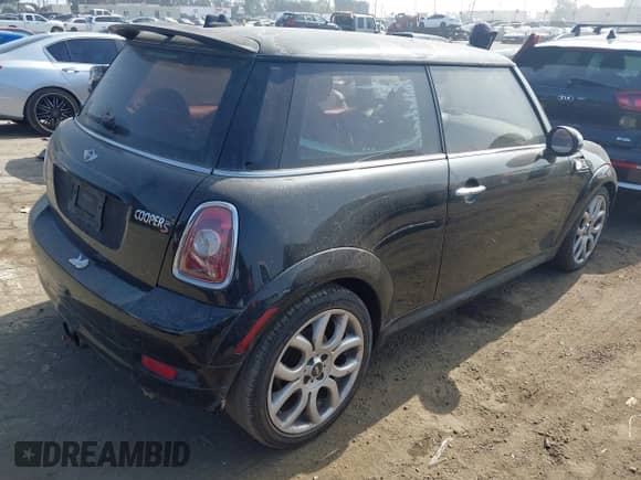 2010 MINI Hardtop S with VIN WMWMF7C50ATX41701, listed as a IAAI auction lot 43607245 with 146,196 mi miles and . Bid and sale history available at DreamBid. Image 4.