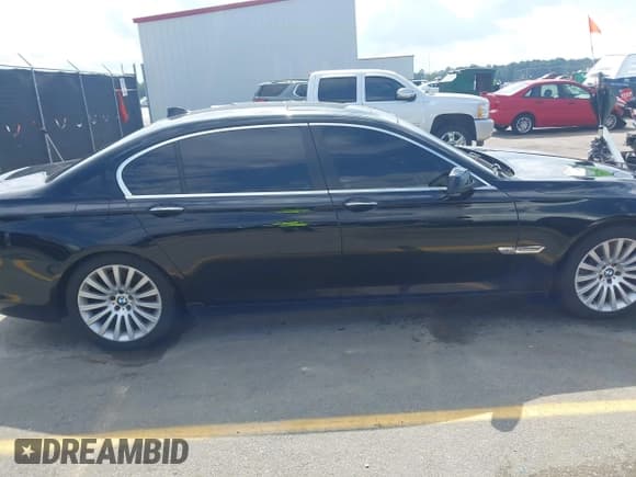 ✅ 2011 BMW 7 Series 750Li xDrive • VIN: WBAKC8C54BC431851 • Lot: 42216519. Listed on IAAI with 106,022 mi. Free auction sales archive from the USA and detailed vehicle history report at DreamBid. Image 13.