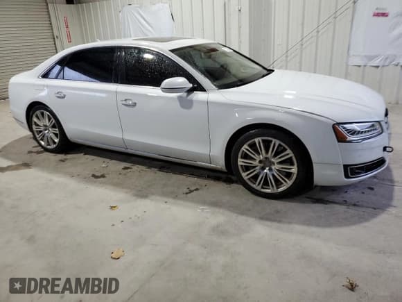 ✅ 2015 Audi A8 3.0L TDI • VIN: WAU3MAFD5FN012106 • Lot: 72339284. Listed on Copart with 138,103 mi. Free auction sales archive from the USA and detailed vehicle history report at DreamBid. Image 4.
