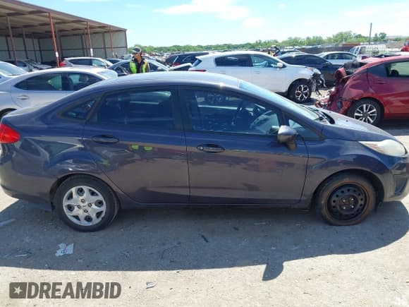 ✅ 2013 Ford Fiesta S • VIN: 3FADP4AJ7DM207683 • Lot: 42220602. Listed on IAAI with 129,549 mi. Free auction sales archive from the USA and detailed vehicle history report at DreamBid. Image 13.