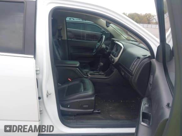 ✅ 2017 GMC Canyon 4WD SLT • VIN: 1GTG6DEN6H1249790 • Лот: 43609704. Опубликован ранее на IAAI с пробегом 141 693 миль. Бесплатный доступ к архиву аукционных продаж из США и подробный отчёт об истории автомобиля на DreamBid. Изображение 5.