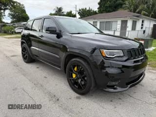 ✅ 2020 Jeep Grand Cherokee SRT • VIN: 1C4RJFDJ1LC132827 • Лот: 89498865. Опубликован ранее на Copart с пробегом 131 000 миль. Бесплатный доступ к архиву аукционных продаж из США и подробный отчёт об истории автомобиля на DreamBid. Изображение 1.