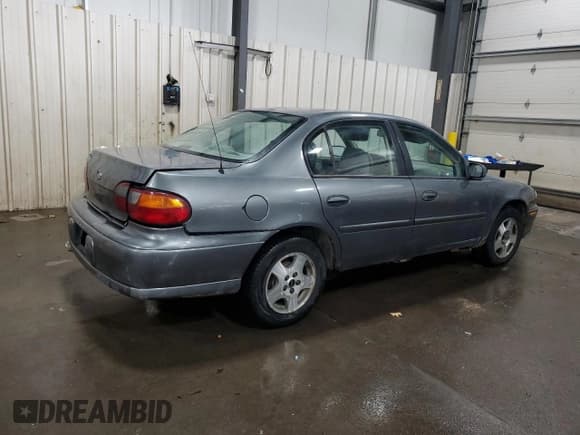 ✅ 2003 Chevrolet Malibu • VIN: 1G1ND52J43M734854 • Lot: 84959605. Listed on Copart with 272,884 mi. Free auction sales archive from the USA and detailed vehicle history report at DreamBid. Image 3.